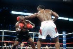 MEMPHIS, TN - JUNE 8:  Lennox Lewis and Mike Tyson fight for the WBC, IBO, IBF, Ring and Lineal heavyweight titles on June 8, 2002 at The Pyramid in Memphis, Tennessee. Lewis won the fight with an 8th round KO. (Photo by Focus on Sport/Getty Images)