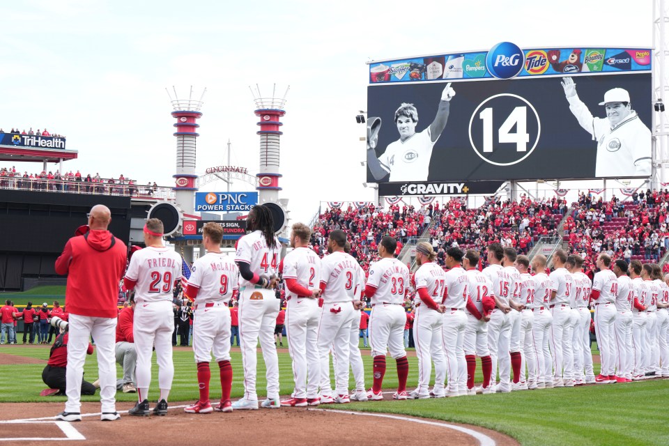 CINCINNATI, OHIO - MARCH 27: The Cincinnati Reds stand for the National Anthem prior to a game against the San Francisco Giants on Opening Day at Great American Ball Park on March 27, 2025 in Cincinnati, Ohio. (Photo by Jeff Dean/Getty Images)