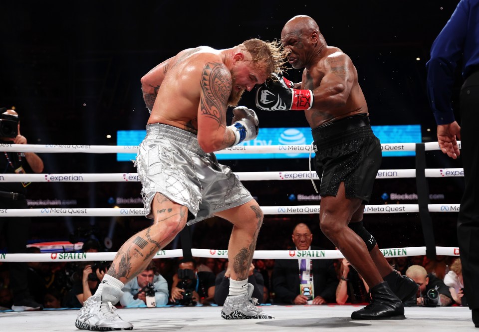 Jake Paul and Mike Tyson boxing.