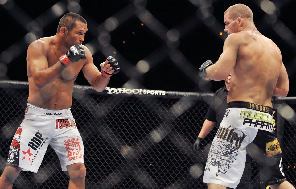 Bisping fought Henderson (left) twice in his UFC career